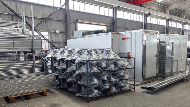 Finished mushroom cultivation equipment and protective packaged spare parts in Xinhai factory storage area